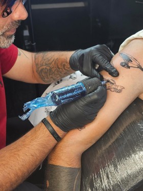 Dot ink tattoo- ת